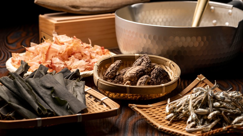 Bowls of dried anchovies, kelp, bonito flakes, and mushrooms