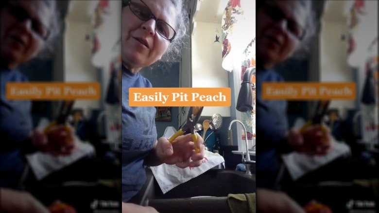 Lori removing peach pit