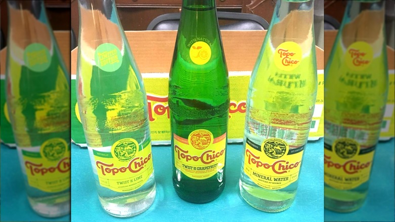 Bottles of Topo Chico lime, grapefruit, and regular