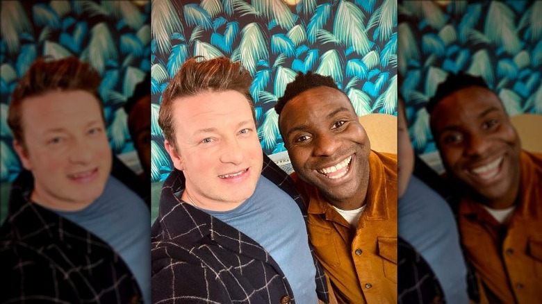 Jamie Oliver and Jimi Femurewa smiling