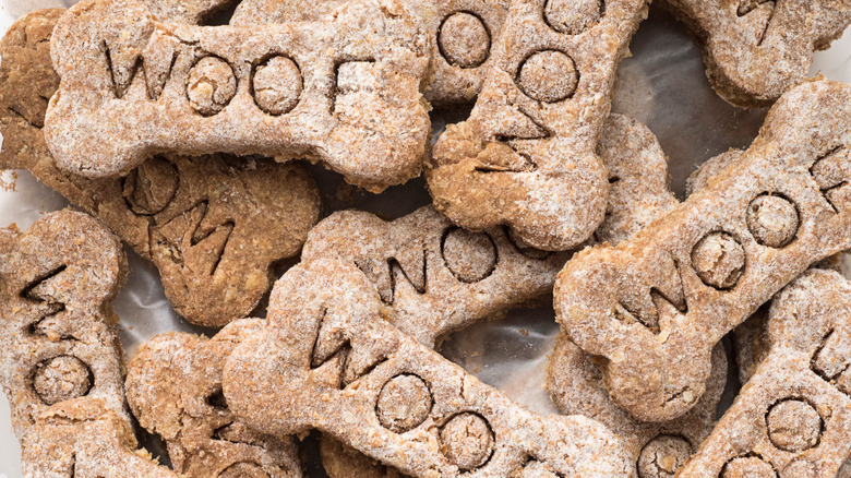 Bunch of dog treats with "Woof" printing