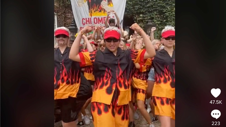 Girls dancing dressed like Guy Fieri