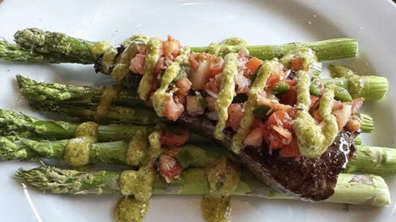 Steak on a bed of asparagus