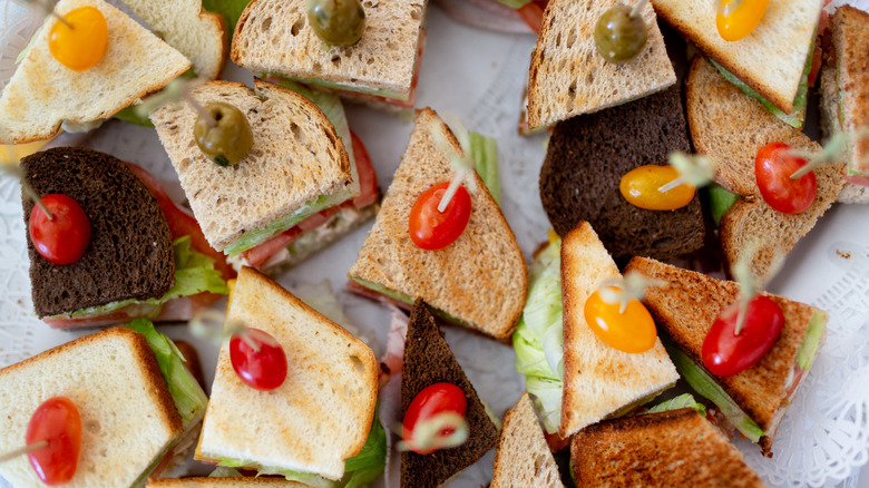 various types of sandwiches on a table