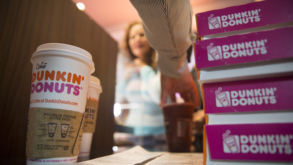 Dunkin' customer getting coffee