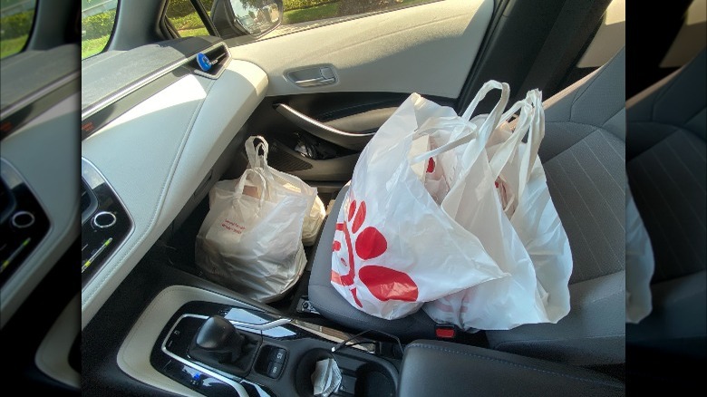 Chick-fil-A bags on car seat
