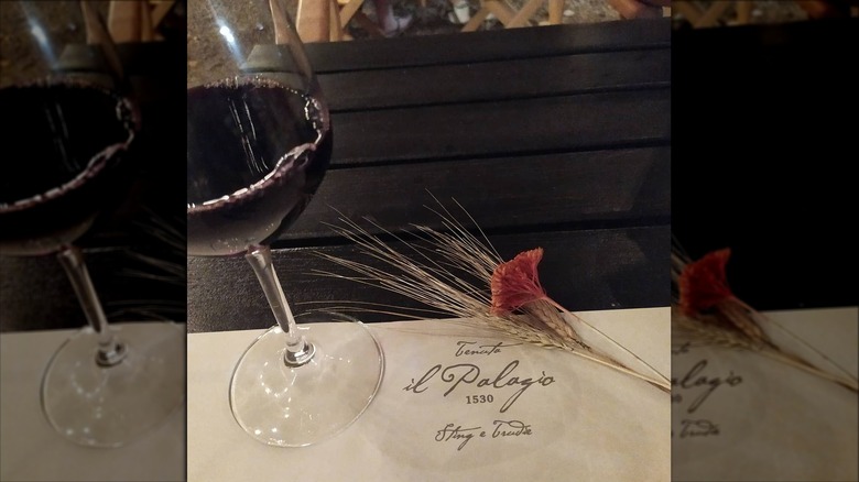 Glass of Il Palagio wine