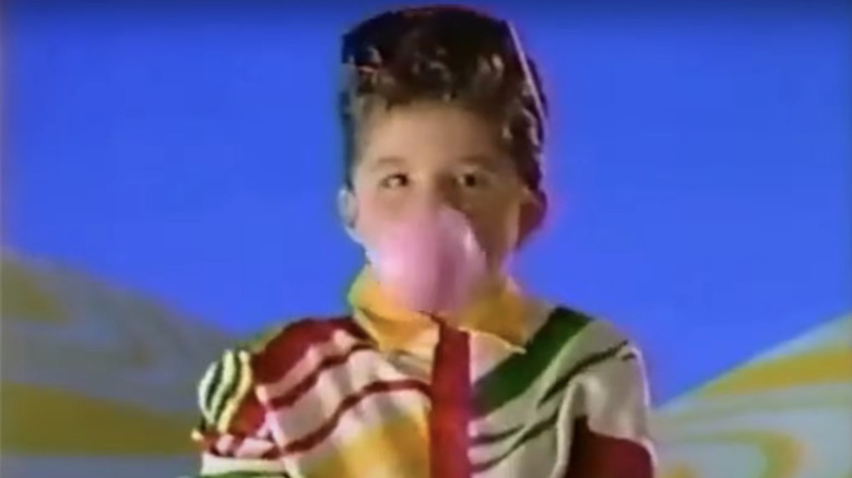 boy blowing bubble