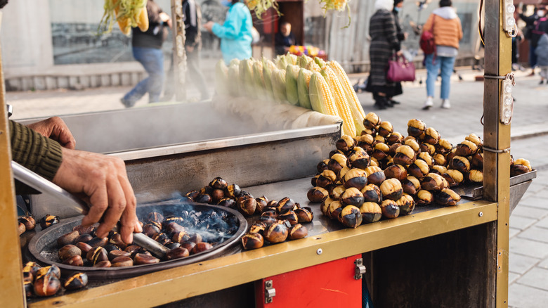 Street vendor roasting chestnuts 