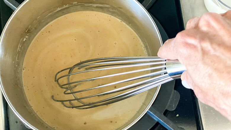 whisking homemade pumpkin pudding