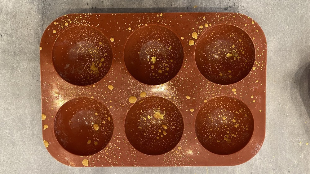 Gold dust on hot chocolate bombs