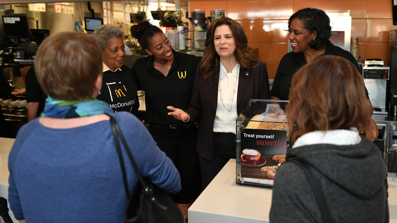 McDonalds franchisees in a meeting with workers