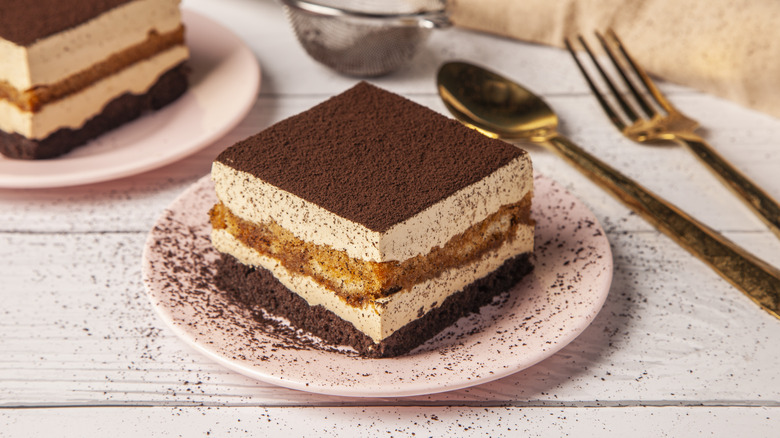 tiramisu on plate with cutlery