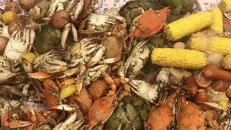 Crab boil with corn and artichokes