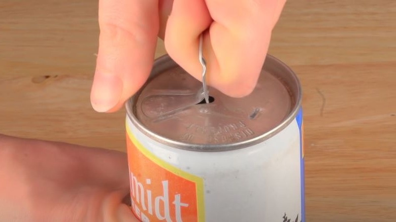 Removable soda can pull-tab