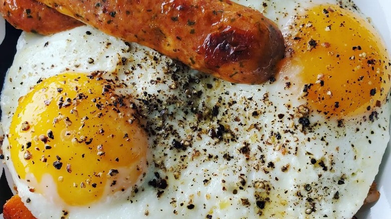 Eggs and sausage with pepper