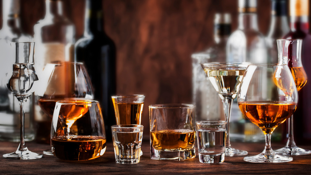 Various glasses filled with a variety of liquor