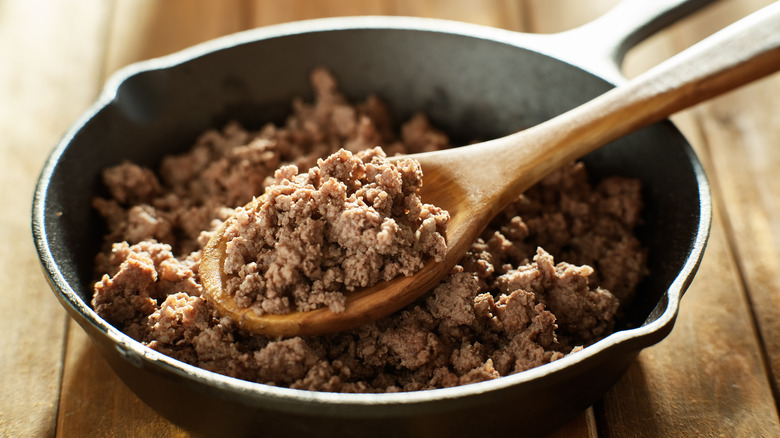 Cooked ground beef in a skillet