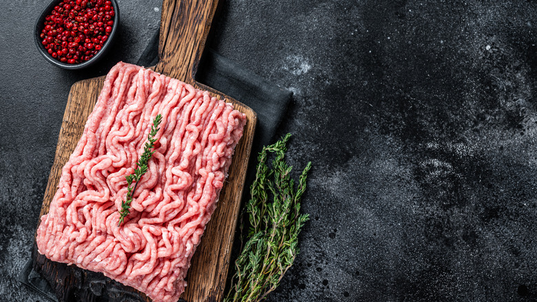 ground turkey on a wooden board