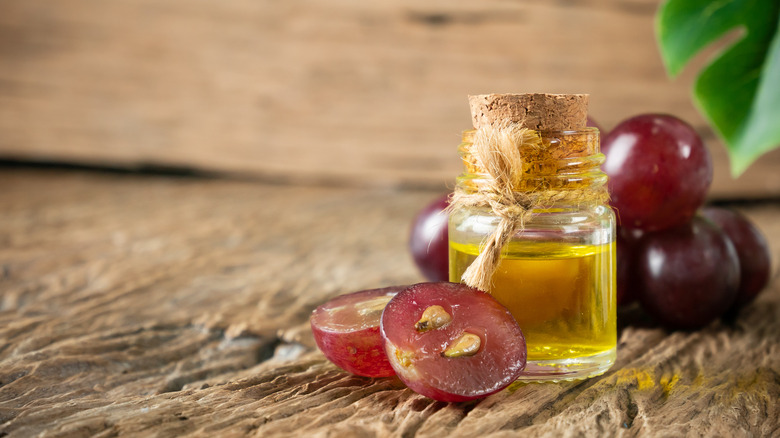 Grapes and a bottle of grapeseed oil