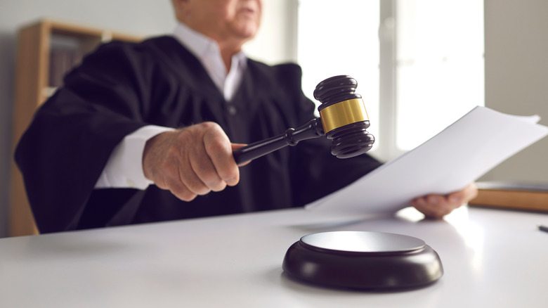 Judge pounding gavel on desk