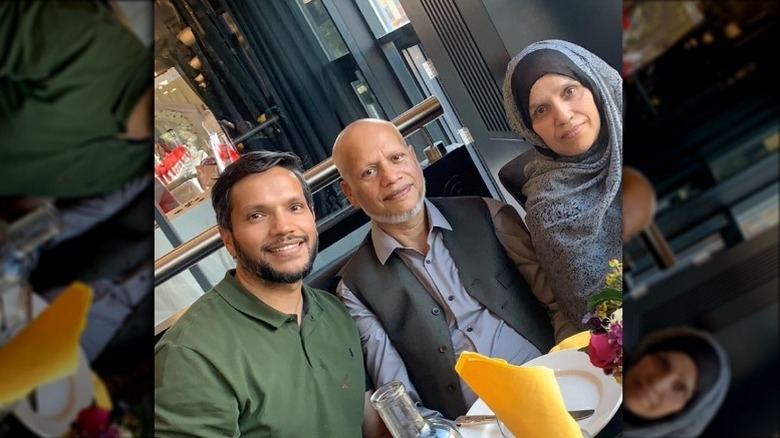 Abdul Hussain and his parents