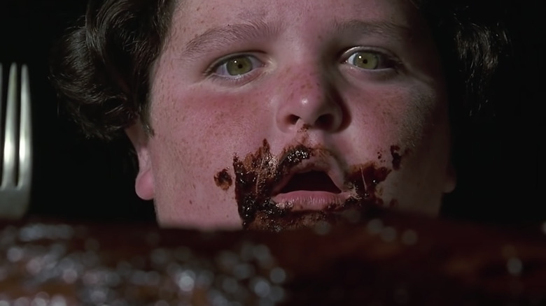 Bruce Bogtrotter eating chocolate cake