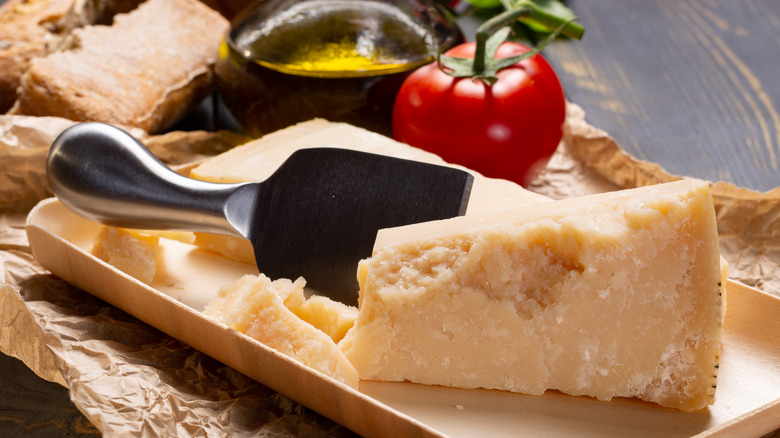 Parmigiano-Reggiano block on cheese board