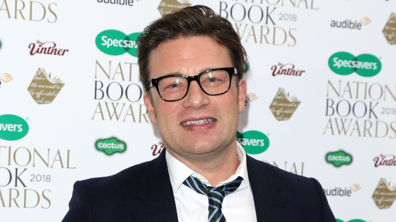 Jamie Oliver in a suit and tie