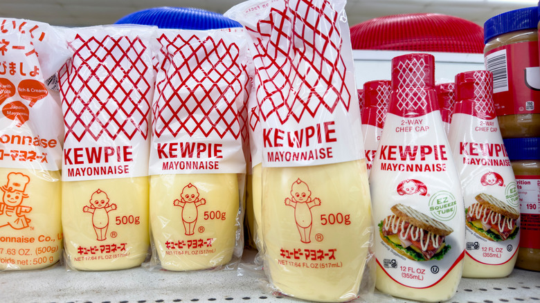 Bottles of Kewpie Mayonnaise on store shelf