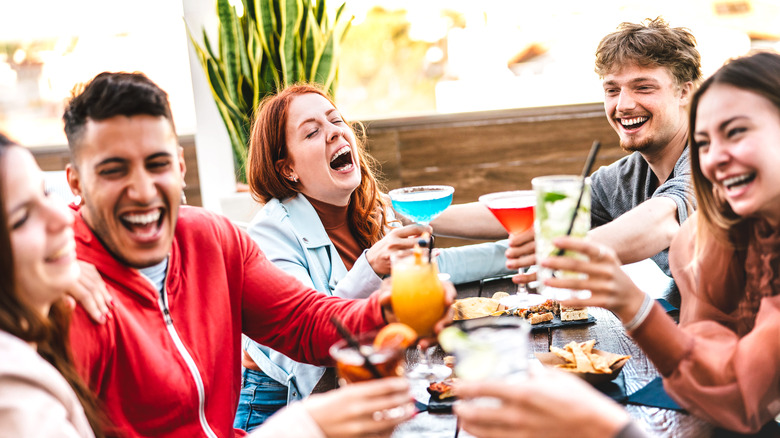 Group of people having drinks together