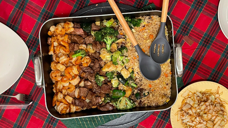 homemade hibachi in pan on plaid cloth