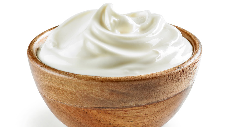 wooden bowl of sour cream