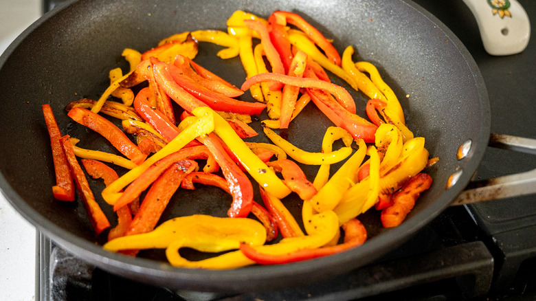 cooked bell peppers in pan