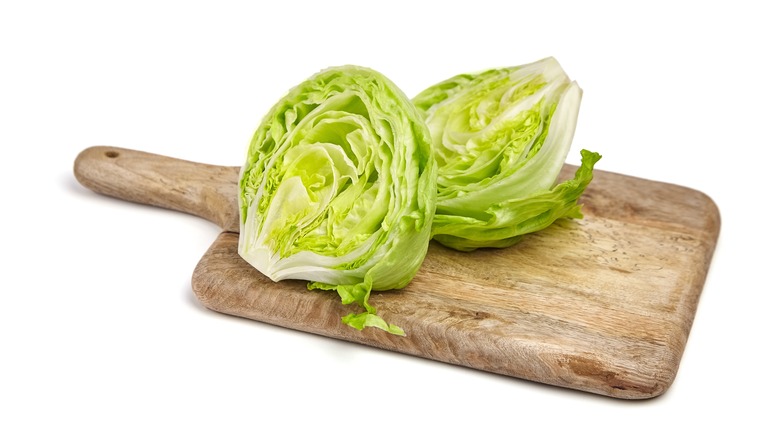 Iceberg lettuce on a cutting board