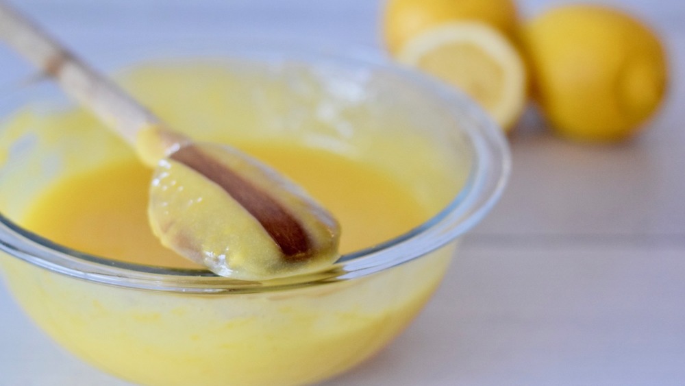 lemon curd on a wooden spoon