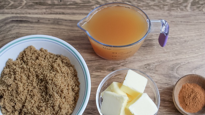 Apple dumpling ingredients on wood