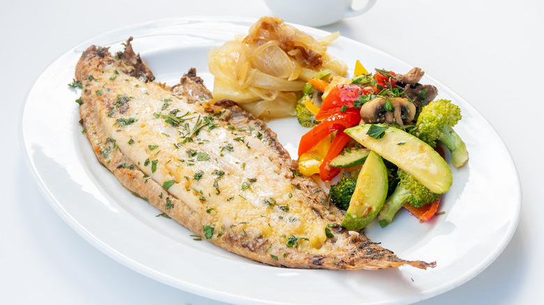 Sole meunière served with vegetables