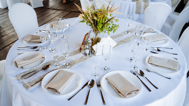 Plates and cutlery carefully arranged