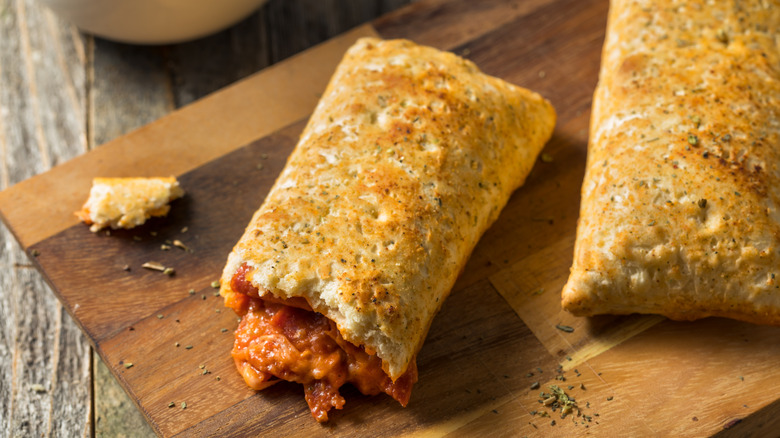 Hot pockets on cutting board