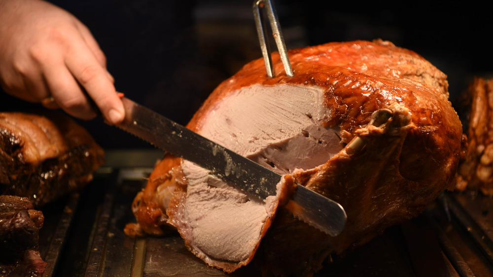 slicing knife cutting meat