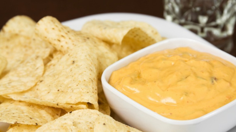 Nacho cheese sauce with chips