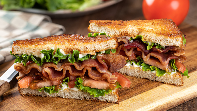 BLT sandwich on cutting board