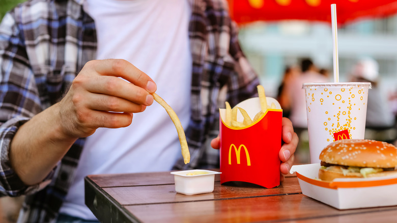 Man Eating McDonalds