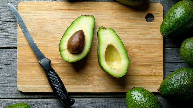 Avocados on cutting board