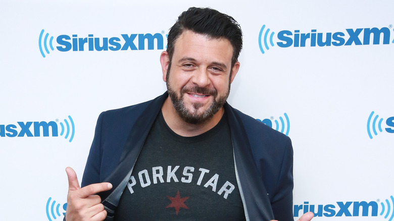 Adam Richman in black