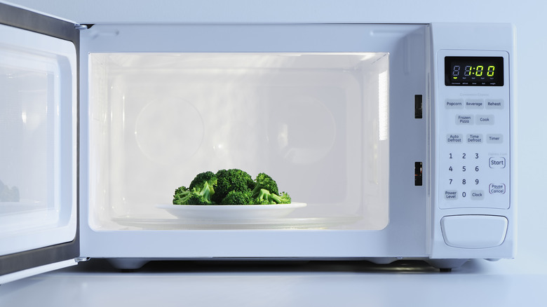 plate of broccoli heating in the microwave