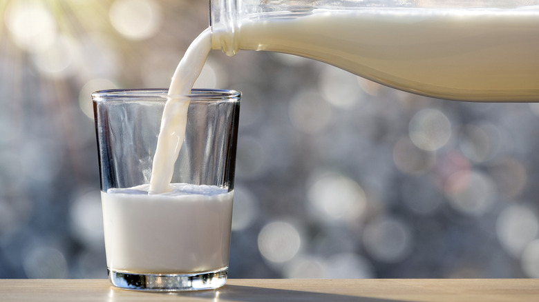 pouring milk into glass