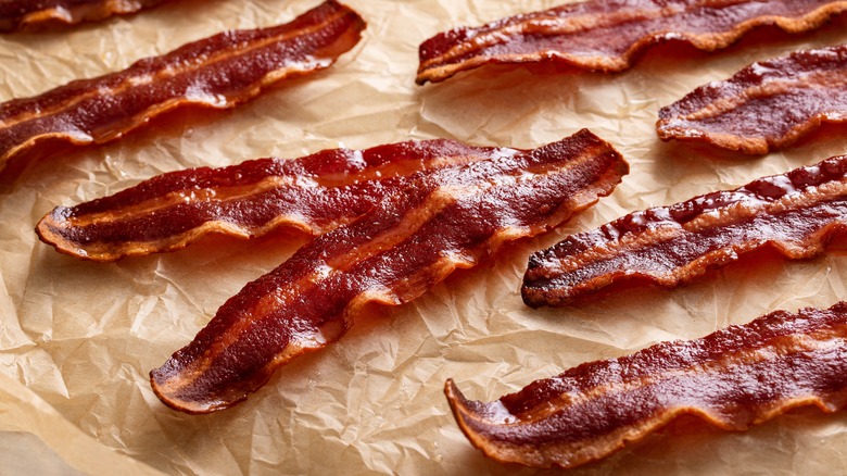 Cooked bacon on parchment paper