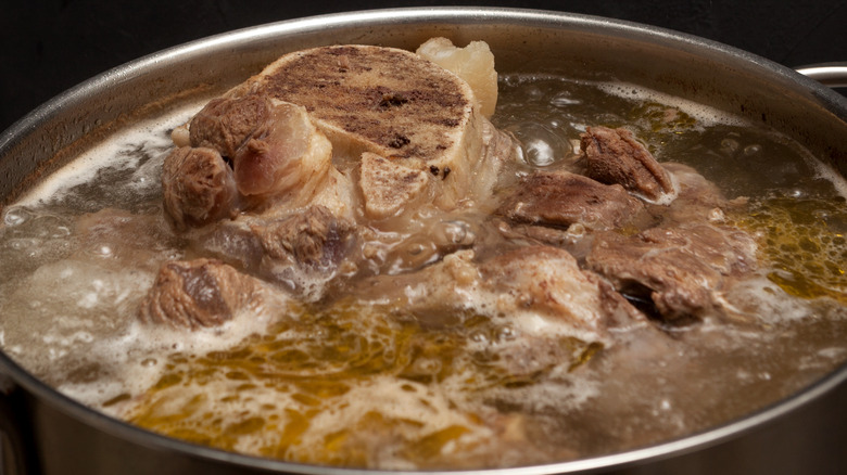 Beef bone broth in a pot